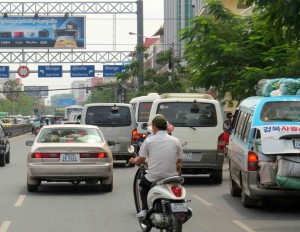 Phnom Penh -- still lots of traffic but more cars than motorbikes.