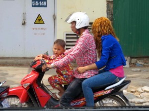 Three on a bike? We saw up to six!