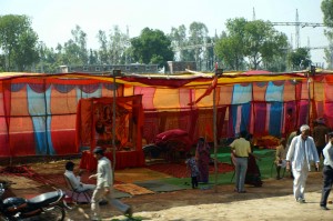 Pilgrim camps along the roadside.