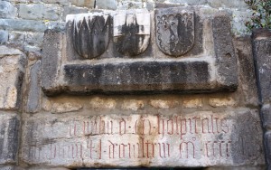 There are many engraved "coats of arms" from the countries and families that served here.