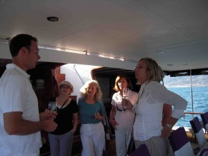 While the men were still coming to the boat, the ladies shared some champagne with the captain, Jere.