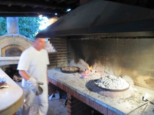 That night we went to a restaurant where they cooked our lamb, veal, an octopus "under the bell," with coals on the top and bottom.