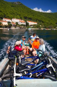 The only way to travel -- a bike taxi across the lake!