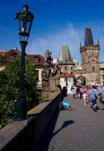 Crossing over the Charles Bridge. BTW, while begging is technically illegal in Prague, the gentleman in the blue shirt (and hundreds of his closest friends) are considered "performance artists" and are therefore able to accept tips... 