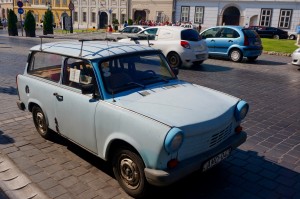 Car as tourist attraction. This is a Trabant, a POS 2-cycle (think your lawn mower) engined jalopy that was built in East Germany during the Cold War. Apparently, they made one color over year. This was Robin's Egg Blue year!