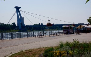 New meets old. There is building all around the Old Town, even in bridges. This bridge has a rotating restaurant on top!