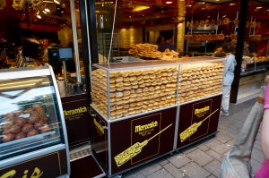 These are jelly doughnuts. It is called a berliner. This is the donut made famous by Pres. Kennedy's speech in Berlin where he either said he was a Berliner, or that he was a jelly doughnut. There's still a lot of discussion about that!