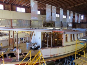 A ferry boat that is currently under restoration at the seaport.