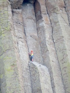 Crazy people climbing the side of the tower. 